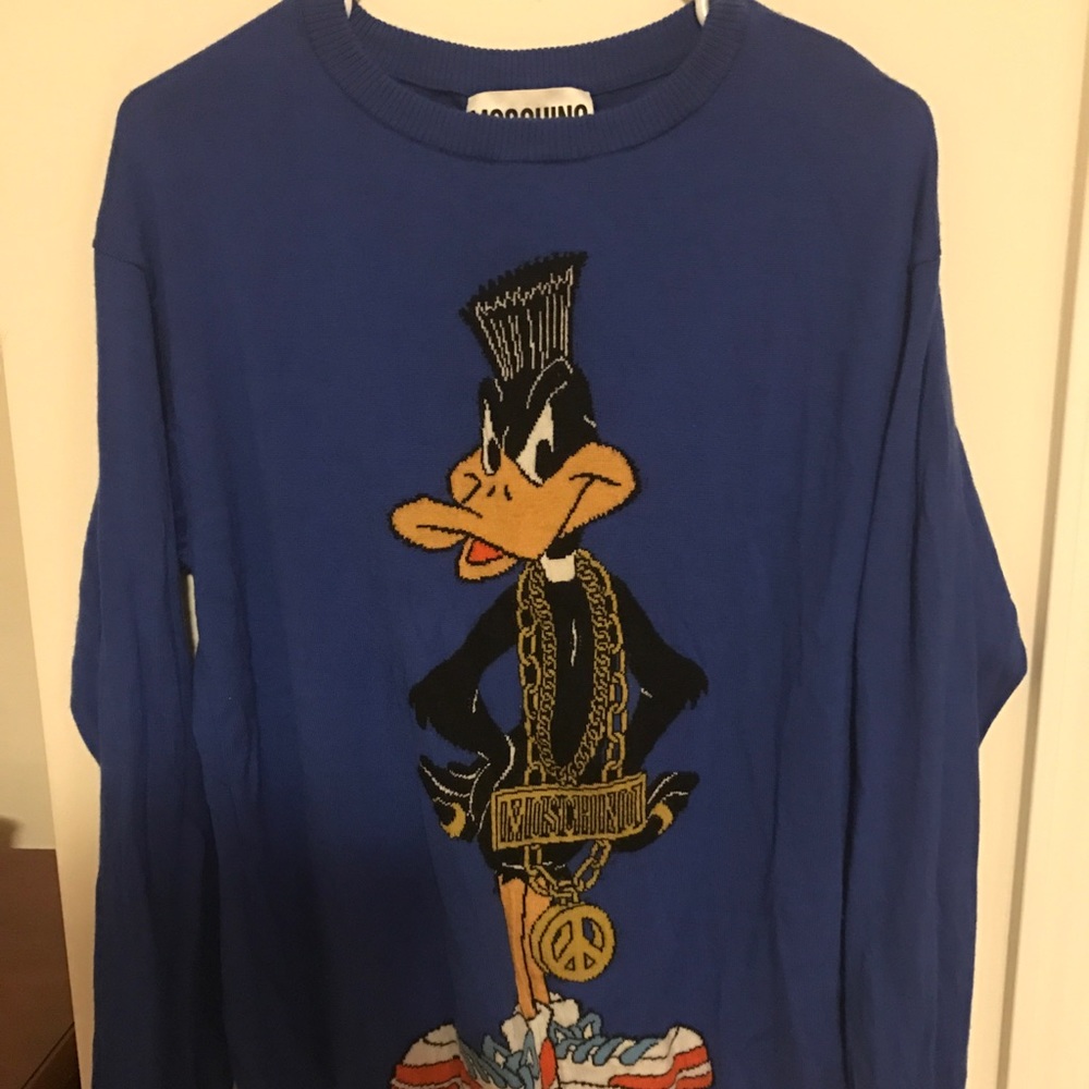 A blue moschino sweatshirt